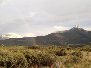 A rainbow over Battlement Mesa, the geological formation for which the community is named. 